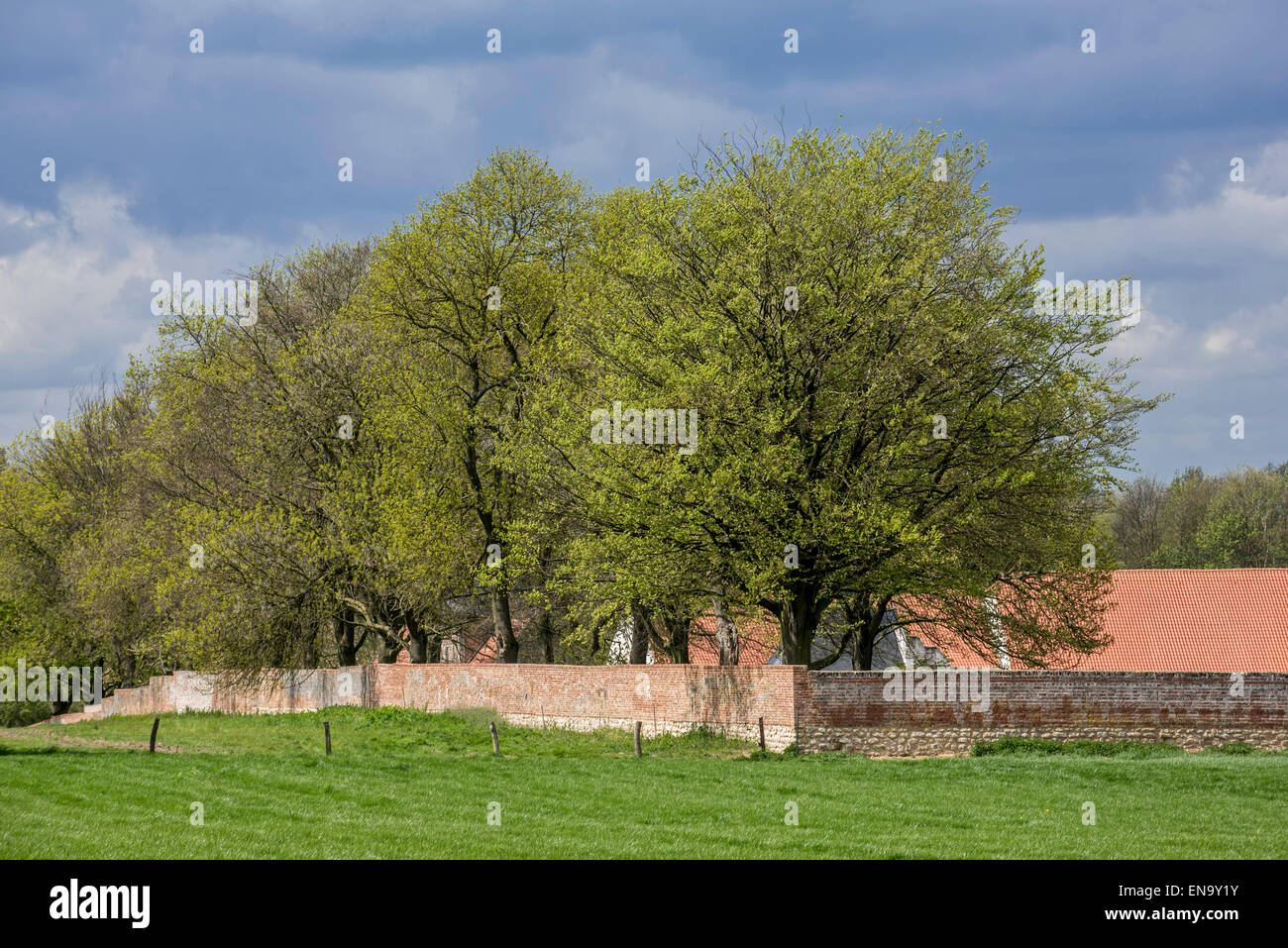 Garden wall of the Château d'Hougoumont, farmhouse where British forces faced Napoleon's Army at the Battle of Waterloo, Belgium Stock Photo