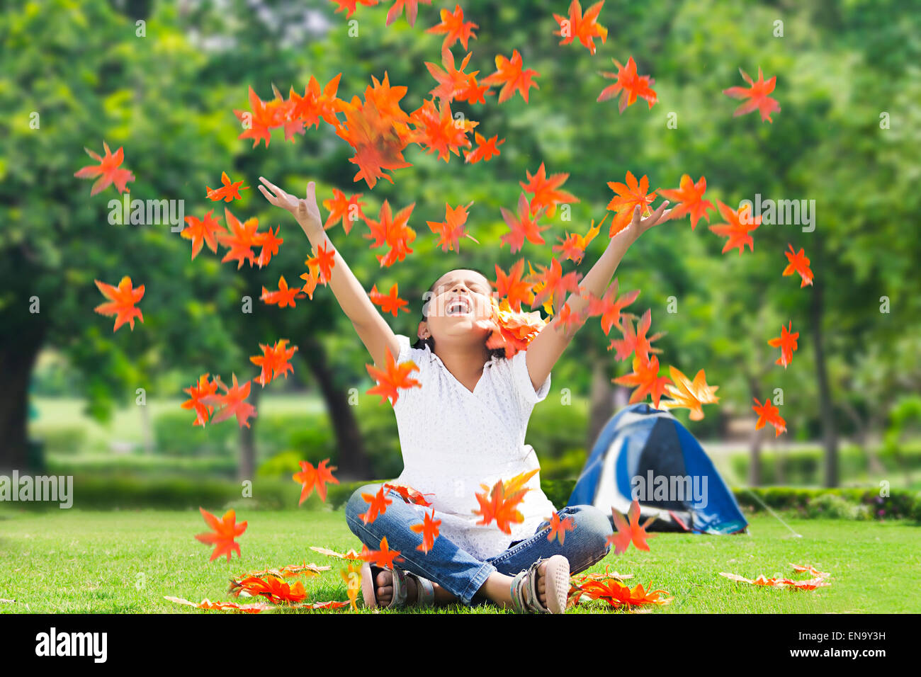 Girl sitting arms legs crossed hi-res stock photography and images - Alamy