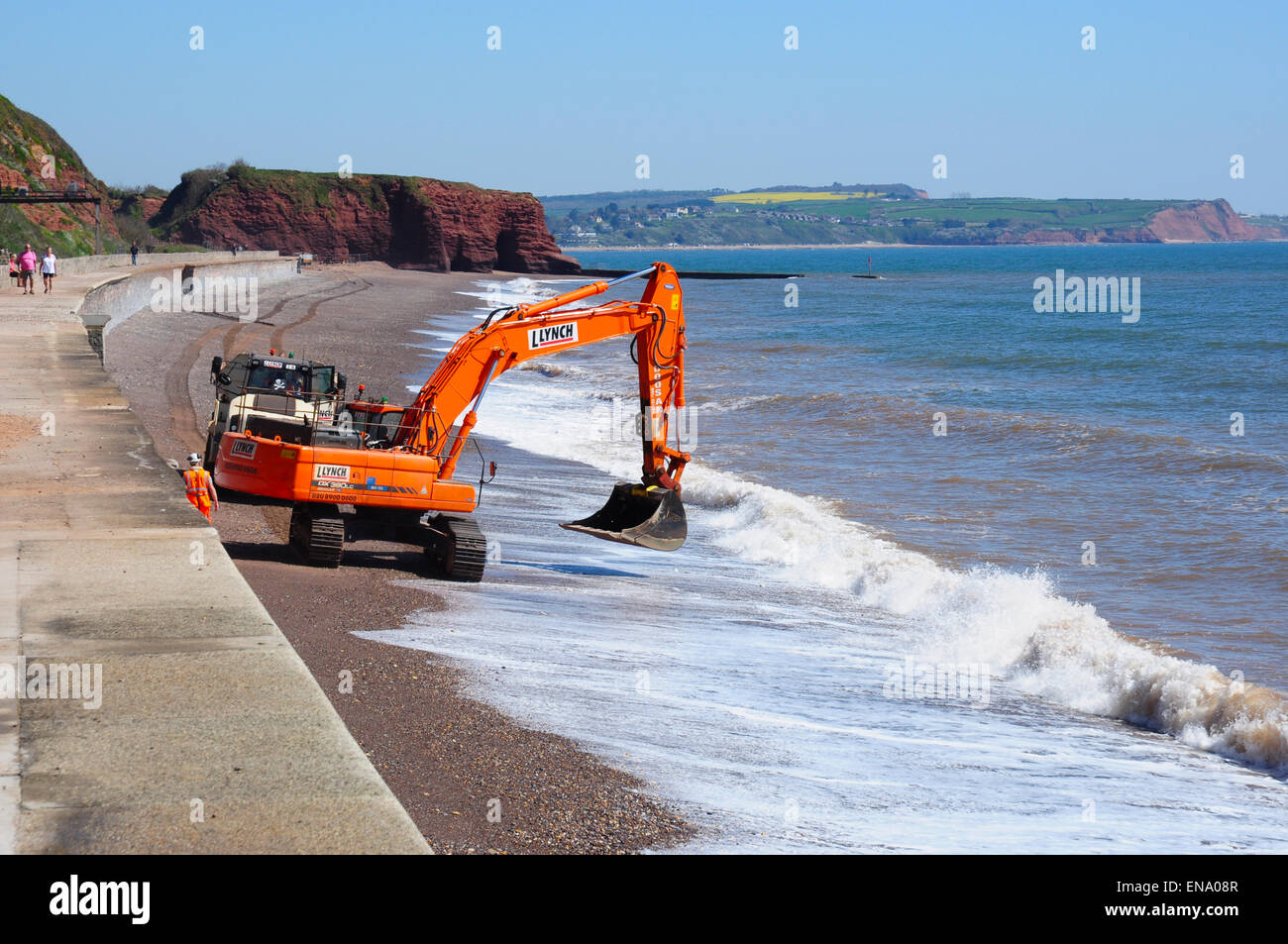 Maintenance digger on the beach near Dawlish, Devon, England, UK Stock Photo Alamy