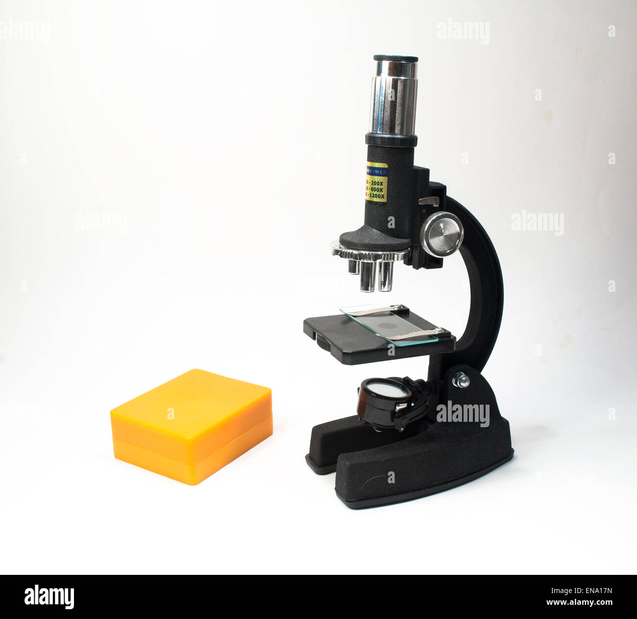 The microscope on a white background. Scientific equipment - optical device in a biological laboratory. Stock Photo