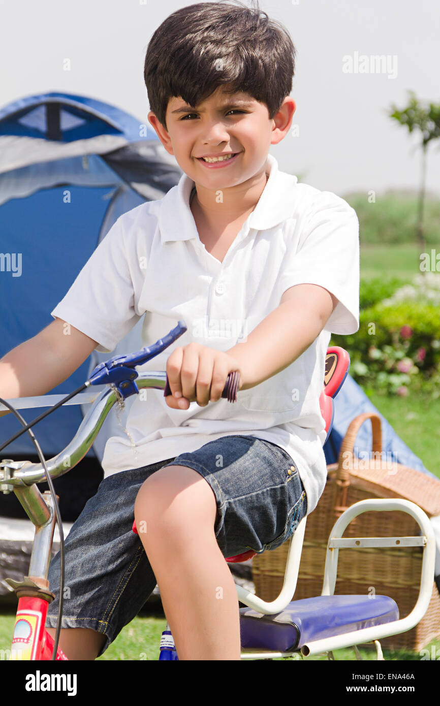 1 indian boy kid park Riding Cycle Stock Photo - Alamy