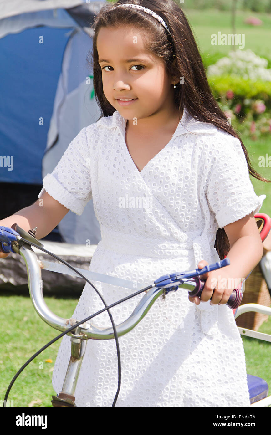 1 indian girl kid park Riding Cycle Stock Photo - Alamy