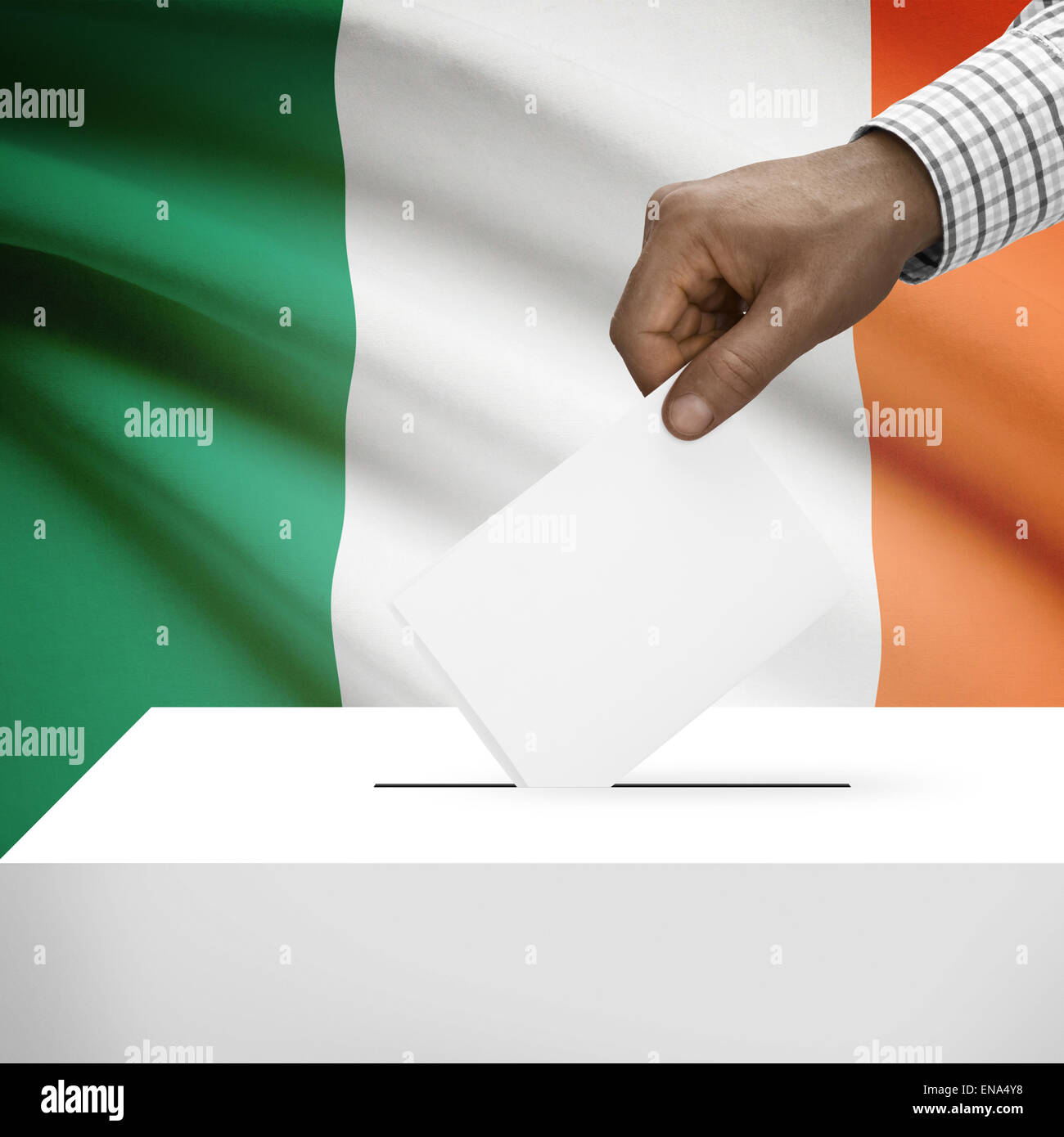 Ballot box with flag on background - Ireland Stock Photo