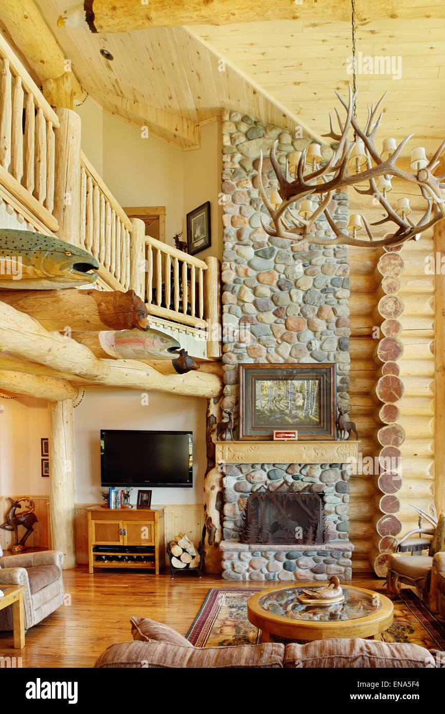 The great room in a modern log cabin, with rustic decor, and furniture  Stock Photo - Alamy