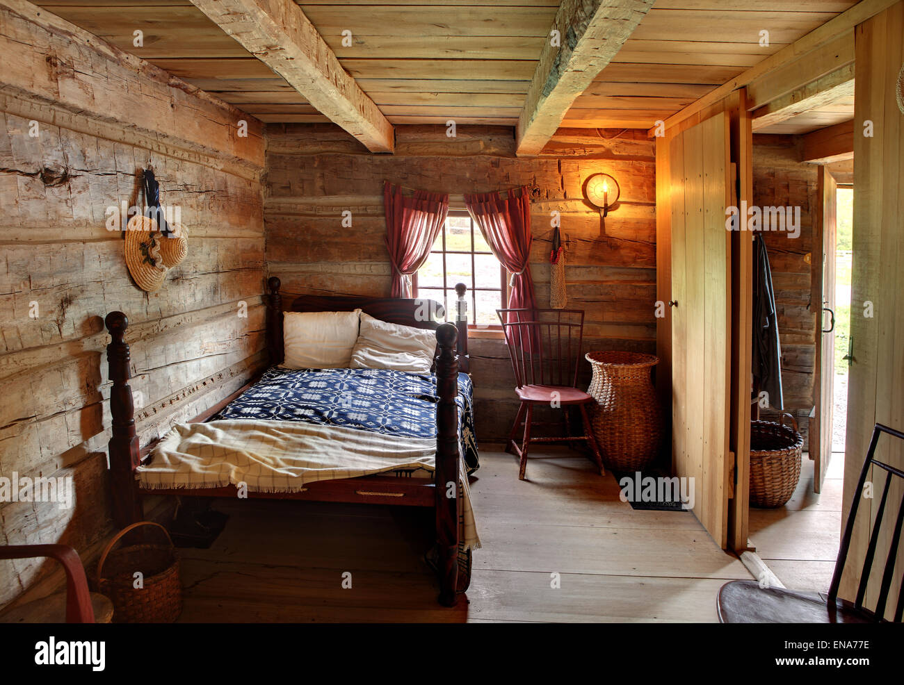 The bedroom interior of the Joseph Smith home at a historical reproduction village. Stock Photo