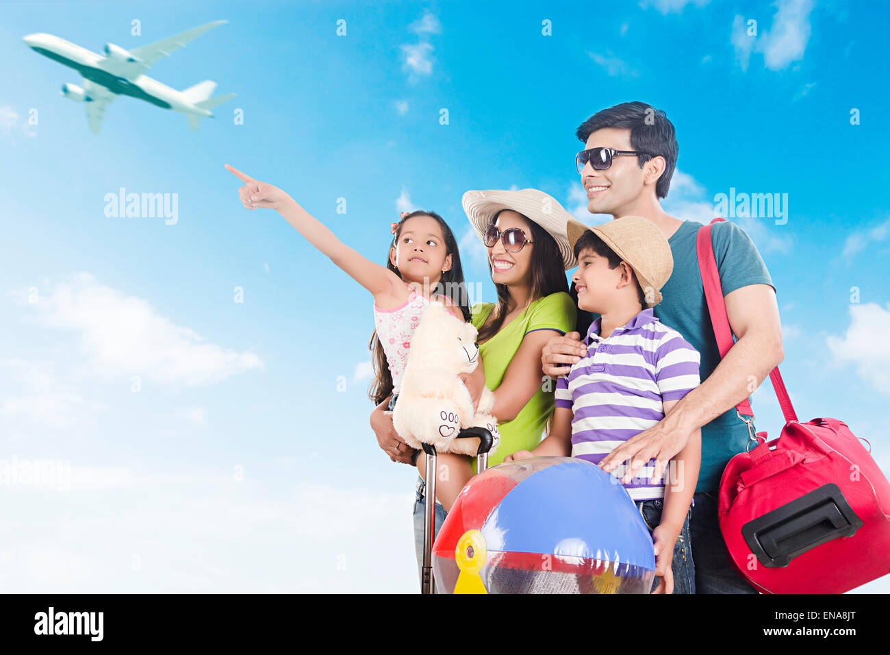 indian Parents and kids happy Journey showing Aeroplane Stock ...