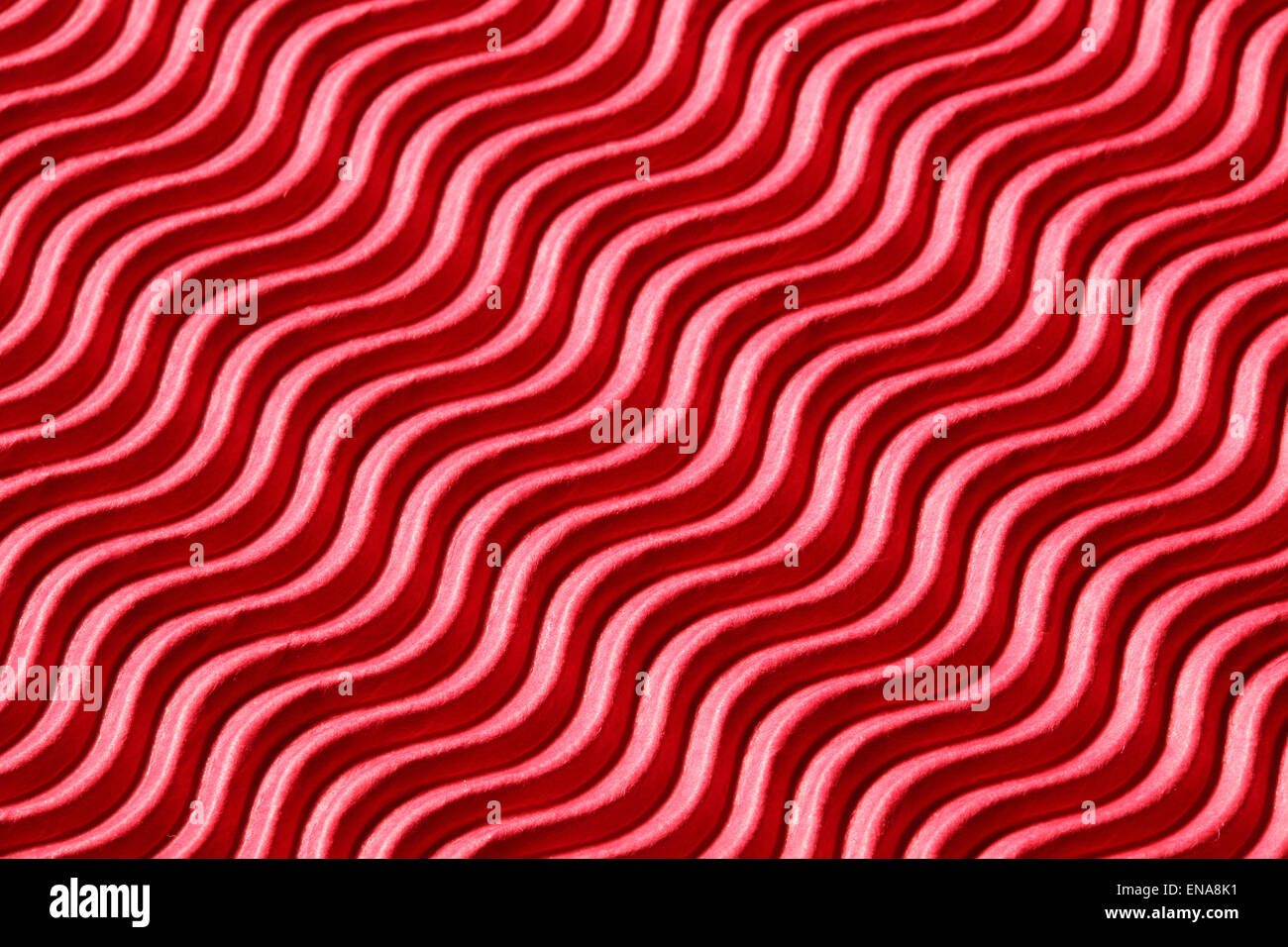 A closeup image of a red corrugated pattern, suitable for a background ...