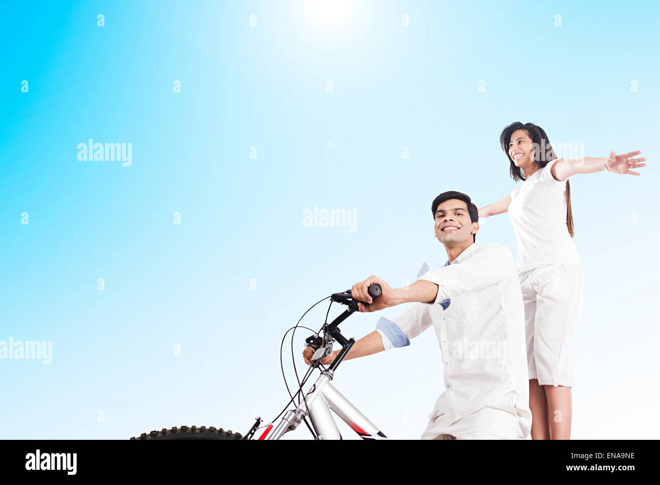 2 indian Married Couples Riding Cycle Stock Photo