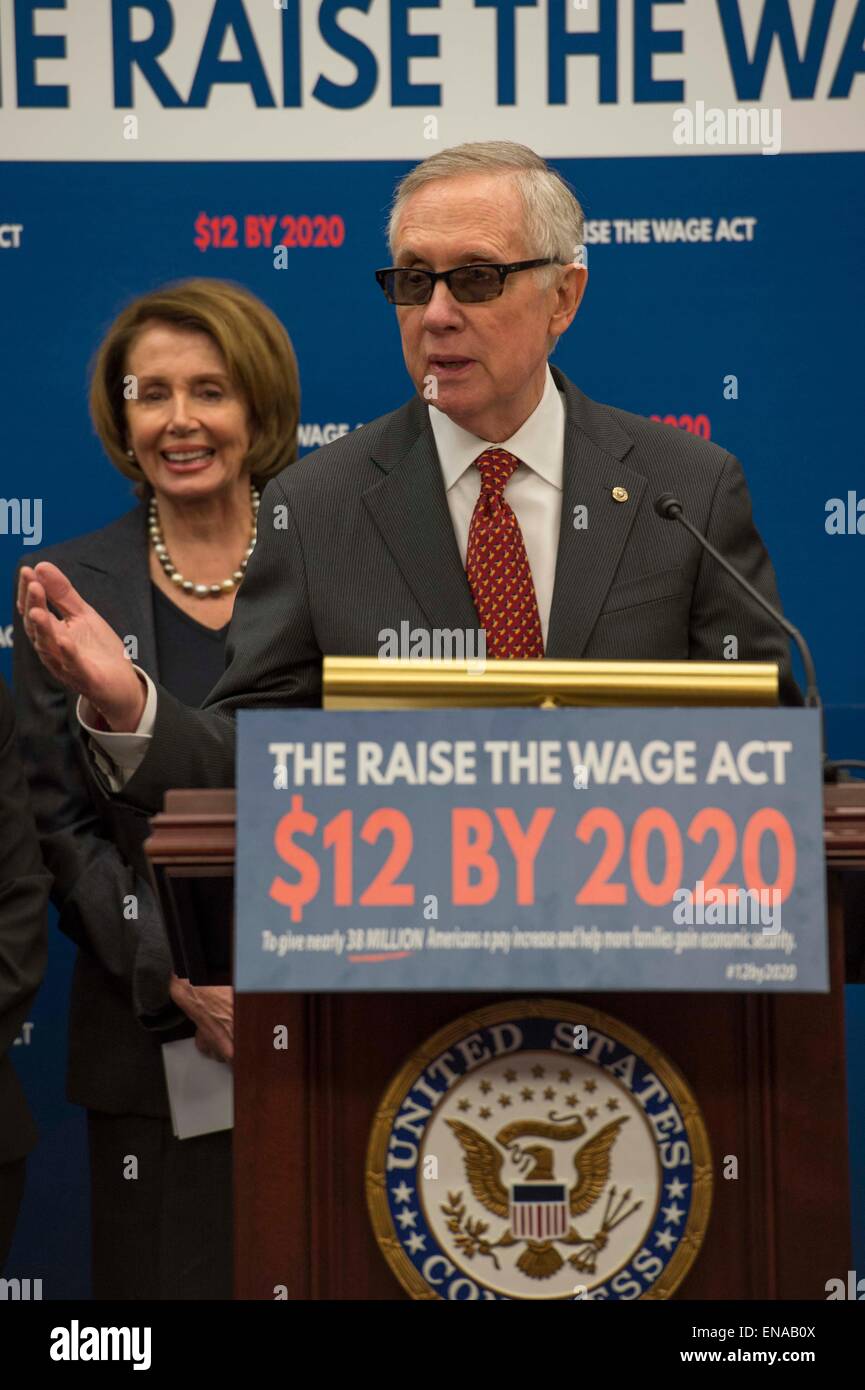 US Senate Minority leader Harry Reid and Rep. Nancy Pelosi during a press conference to announce the Raise the Wage Act proposal to raise the minimum wage April 30, 2015 in Washington, DC. Stock Photo
