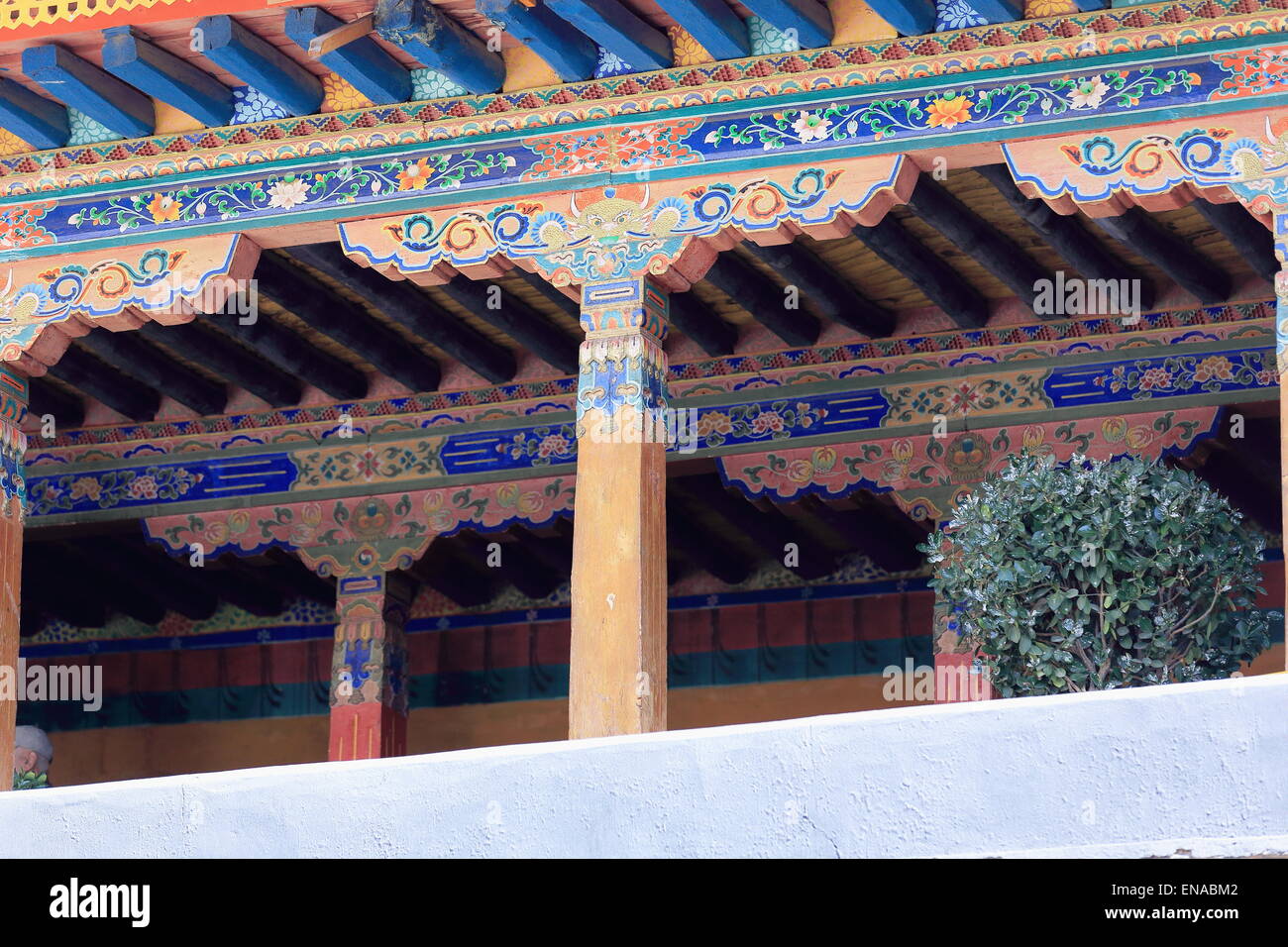 Manycolored wooden balcony showing buddhist decorative elements in the 642 AD.founded-25000 m2 Jokhang-House of Buddha. Lhasa. Stock Photo