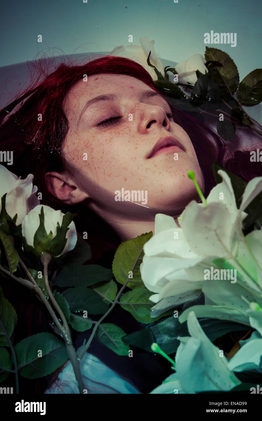 young girl lying in water, romantic scene Stock Photo - Alamy