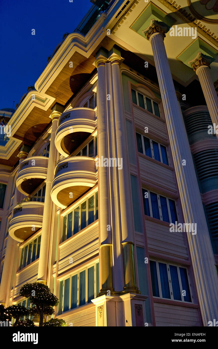 Apartments lit at night and viewed from below. Stock Photo