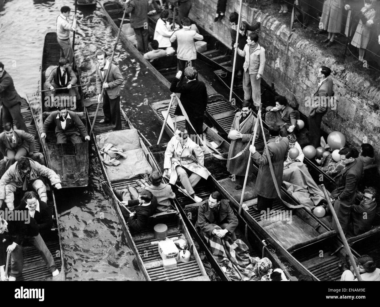 FILE PHOTOS: Oxford, Oxfordshire, UK. 1st May, 1954. Oxford May Day. Some of the people who had an early outing on the Cherwell River today in punts near Magdalen Bridge to celebrate May morning in 1954. Oxford Mail/Alamy Features . Stock Photo