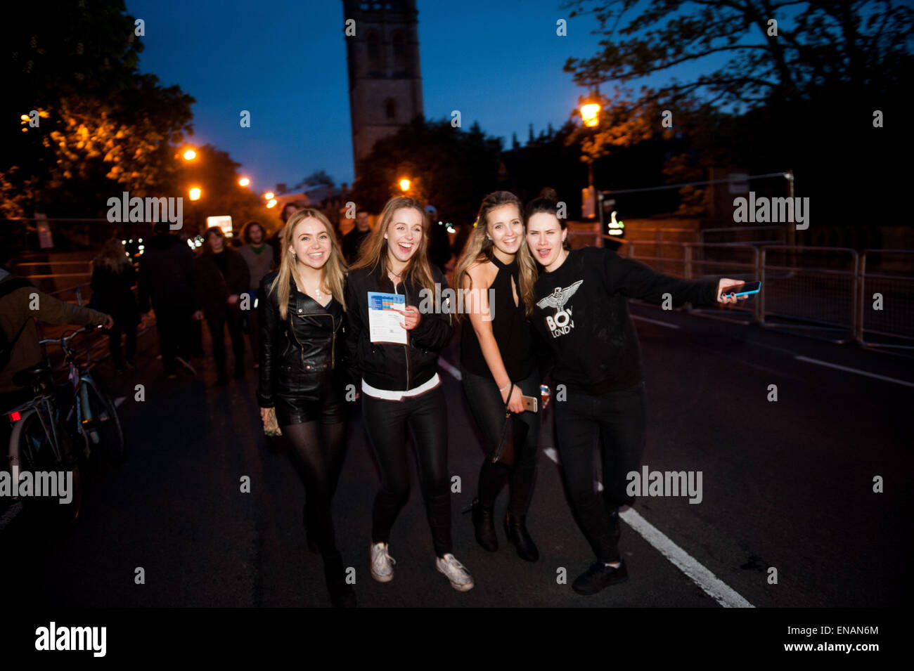 Revellers celebrate Mayday in Oxford. Choristers of Magdalen College Choir sing the Hymnus Eucharist at 6am Stock Photo