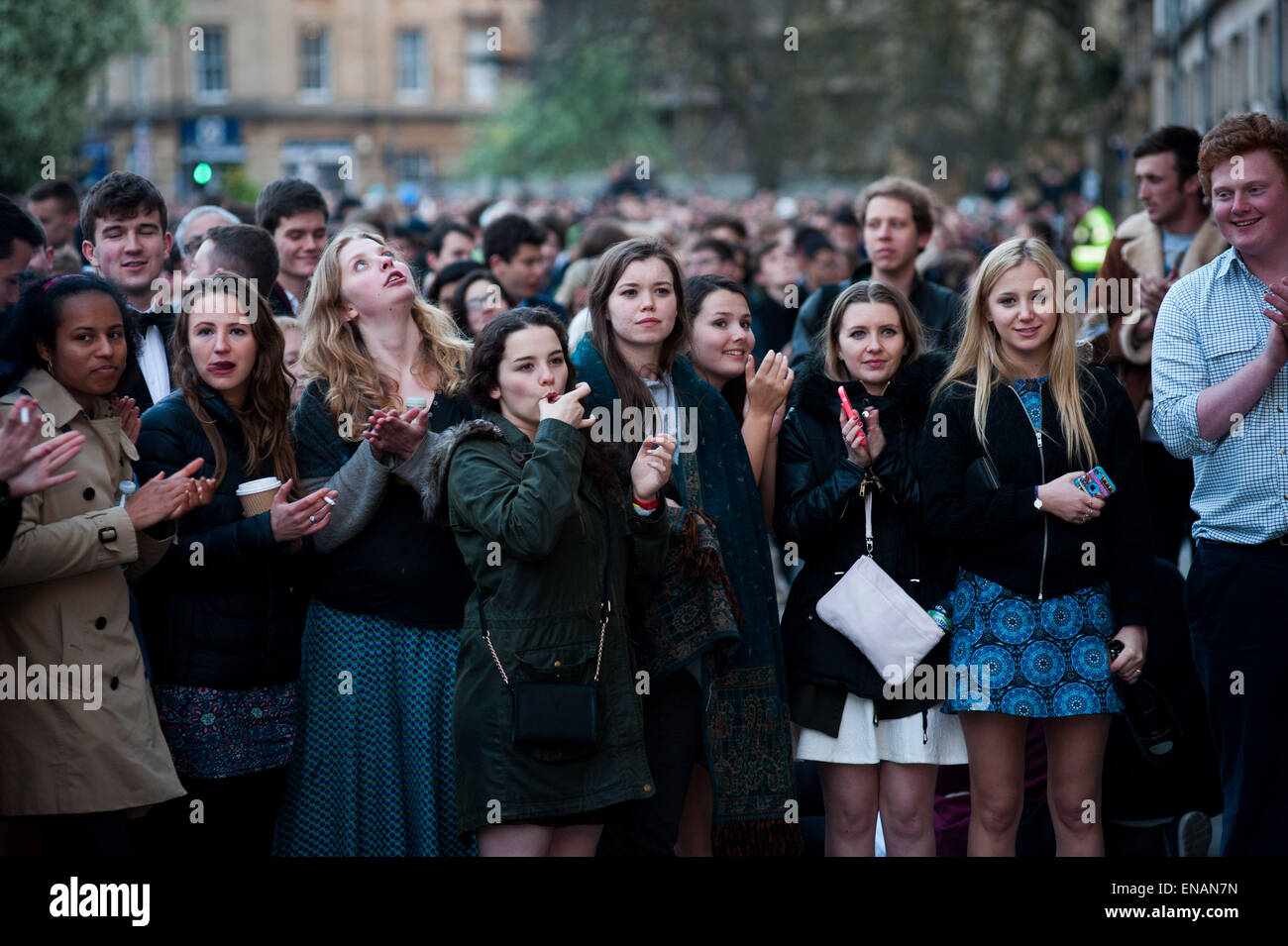 Revellers celebrate Mayday in Oxford. Choristers of Magdalen College Choir sing the Hymnus Eucharist at 6am Stock Photo