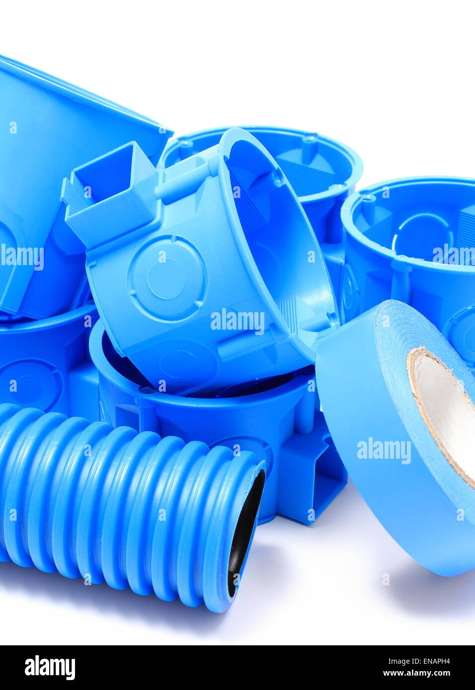 Heap of blue electrical boxes and components for use in electrical