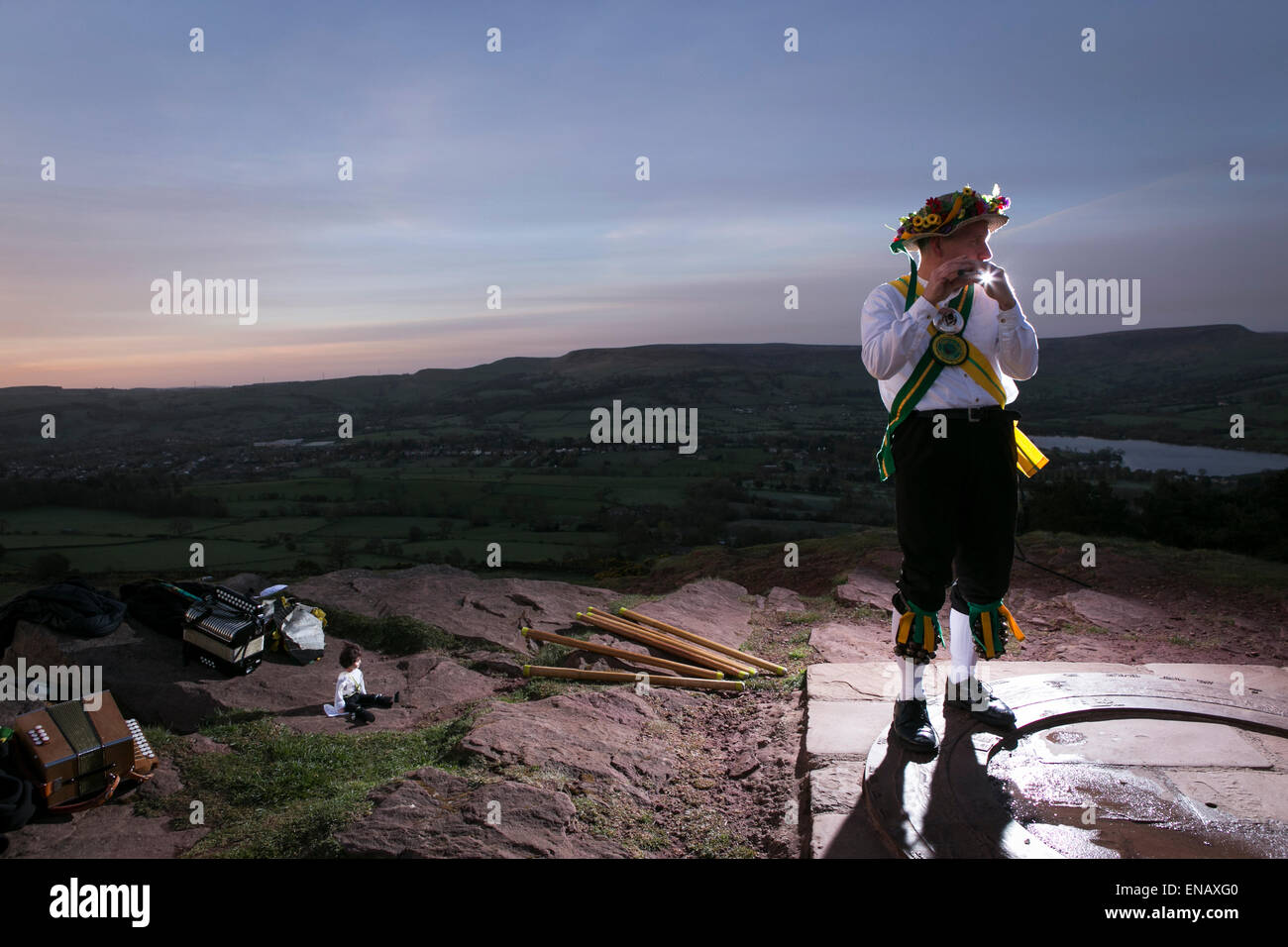 Morris dancers from the ChapelenleFrith Morris Men dance at sunrise