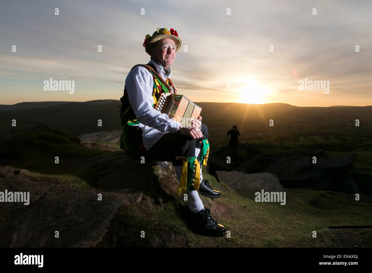 Morris dancers from the ChapelenleFrith Morris Men dance at sunrise