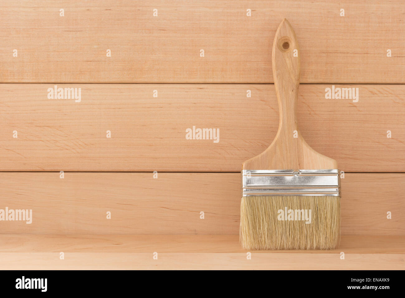 paint brush on wooden background Stock Photo - Alamy