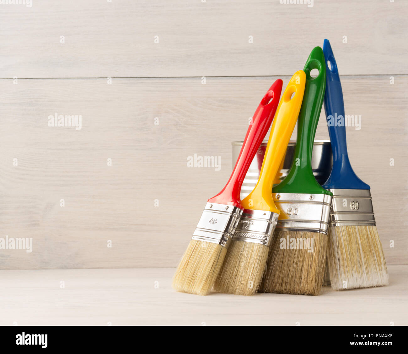 paint brush on wooden background Stock Photo - Alamy