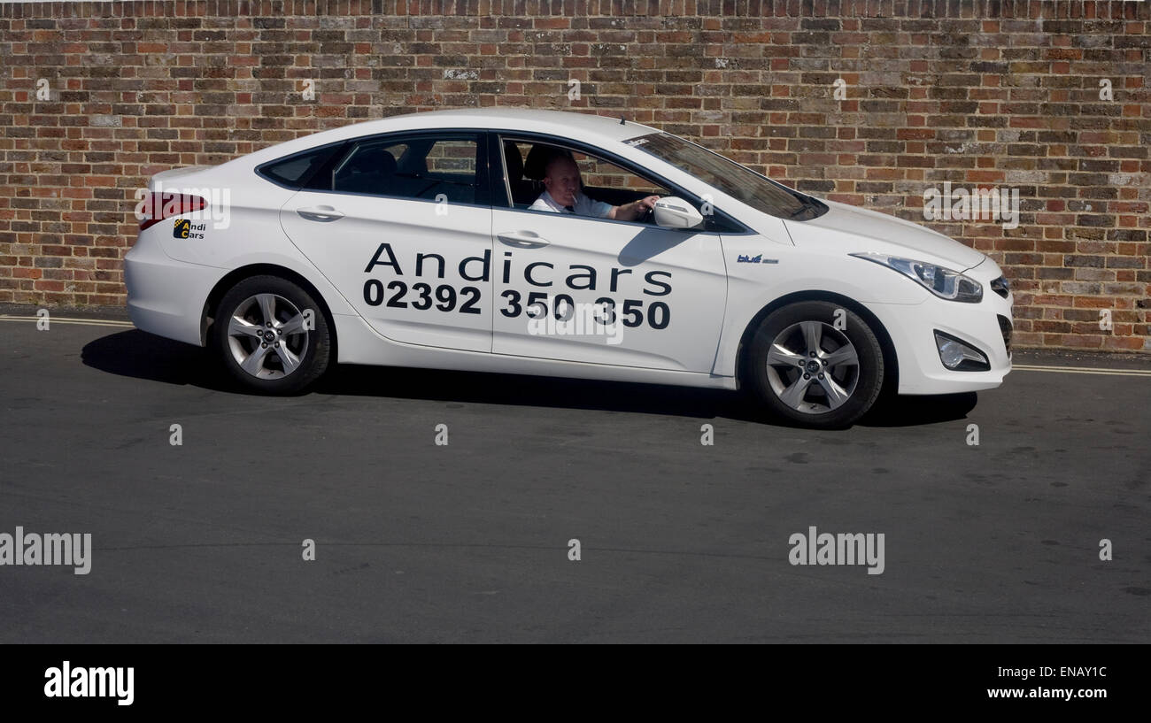 white Andicars taxi with driving waiting Stock Photo