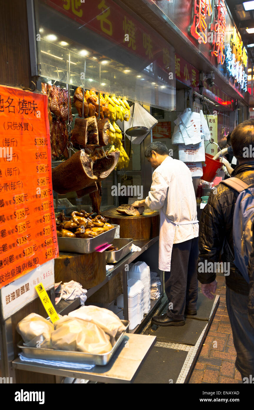 dh Market shop CAUSEWAY BAY HONG KONG Stall owner chopping cooked meat