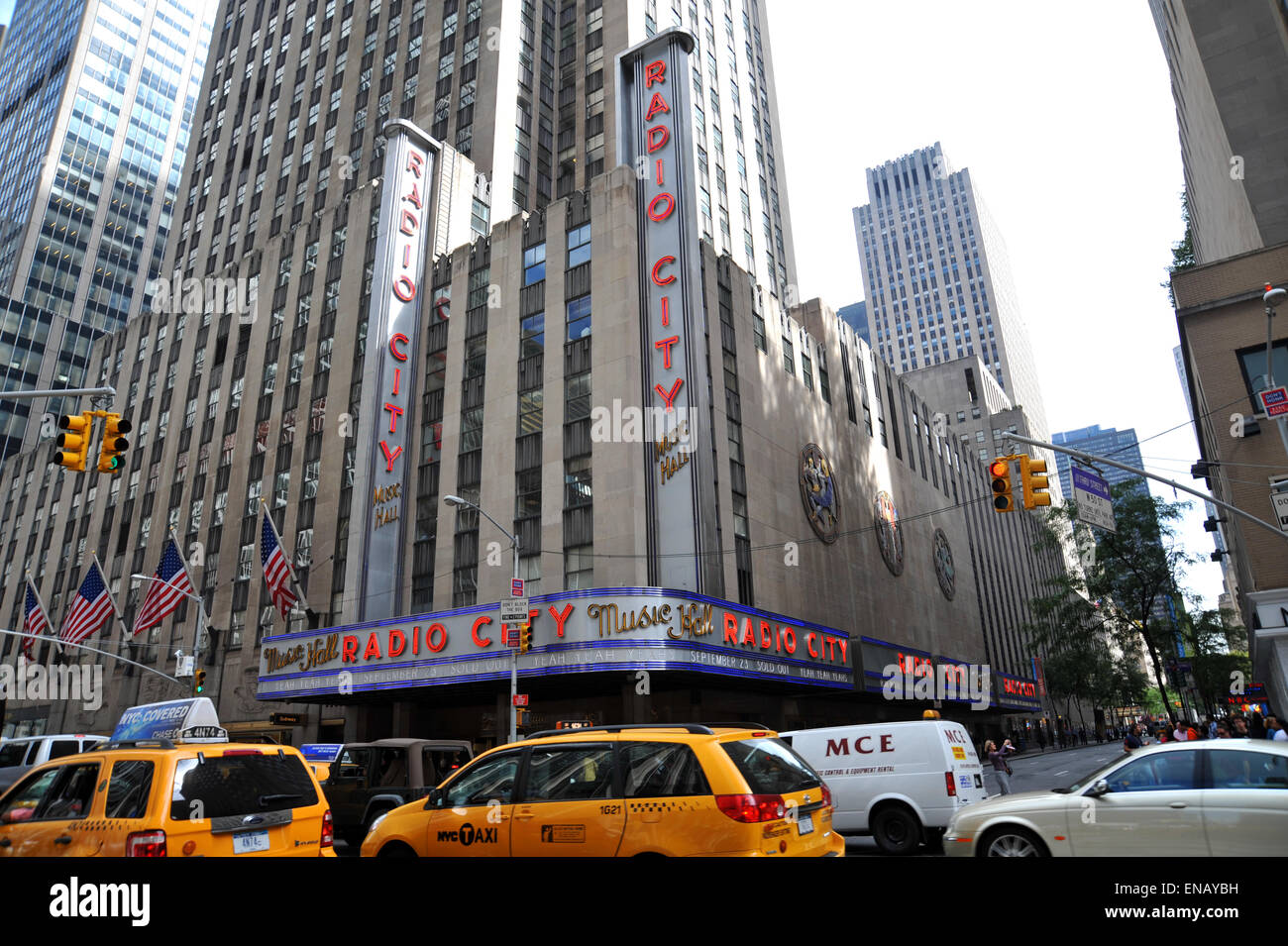 Radio City Music Hall, art deco New York surrounded by yellow cabs Stock Photo
