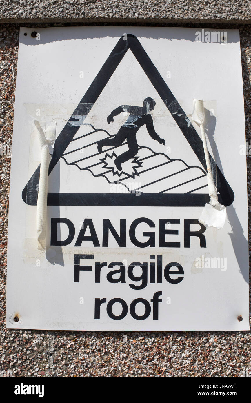 Danger Fragile roof sign warning garage flat roofs Stock Photo Alamy