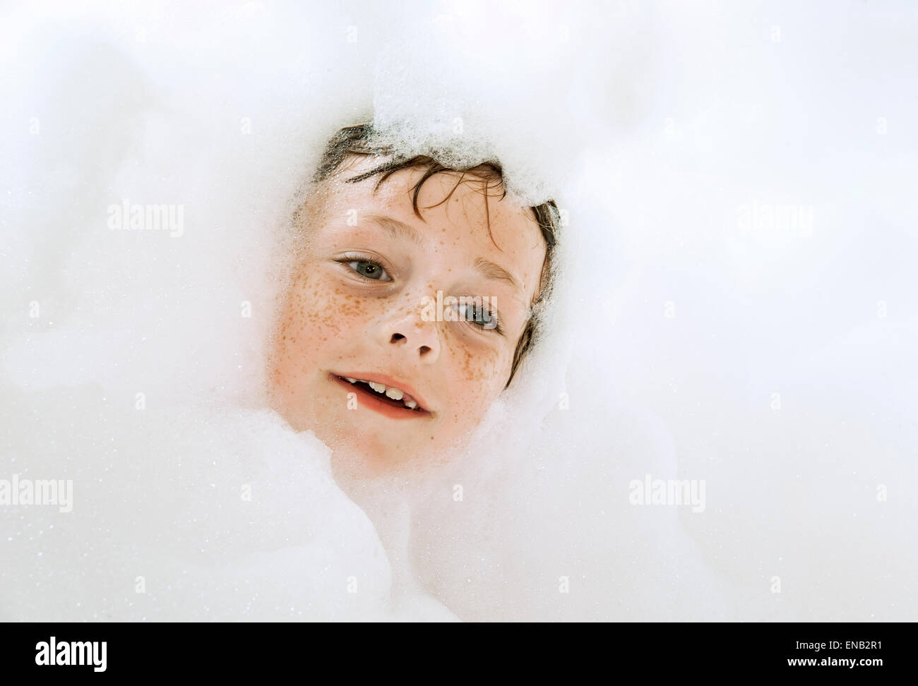 Boy taking bubble bath Stock Photo Alamy