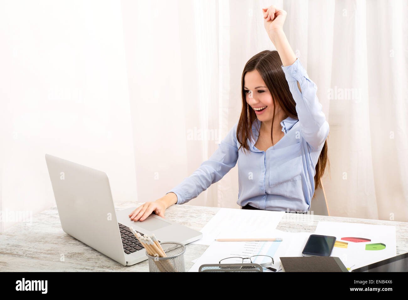 Successful Businesswoman at the office Stock Photo - Alamy