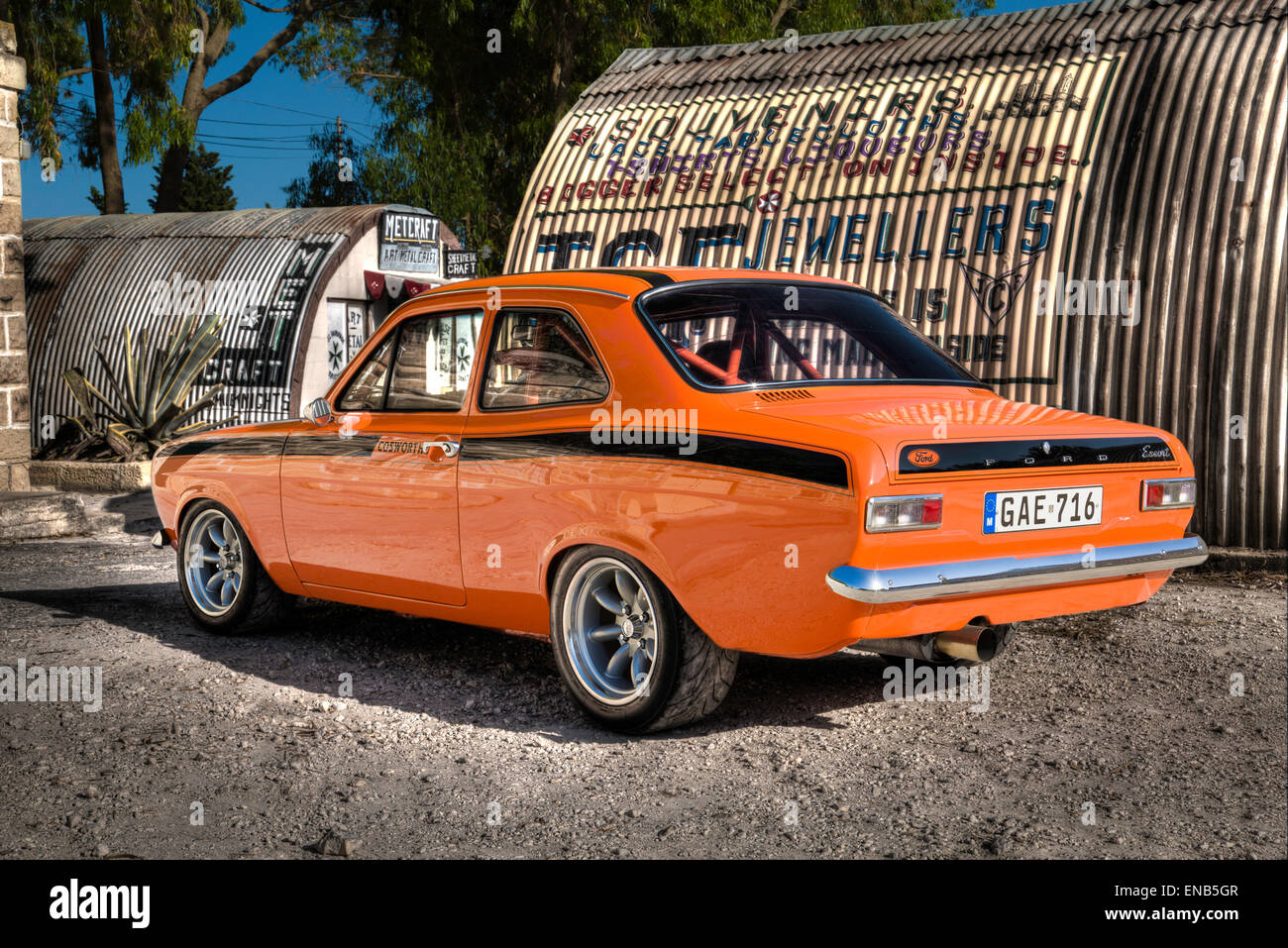 FFord MKI Escort Mexico coloured orange in Malta with a Cosworth Engine at the glass works. Stock Photo