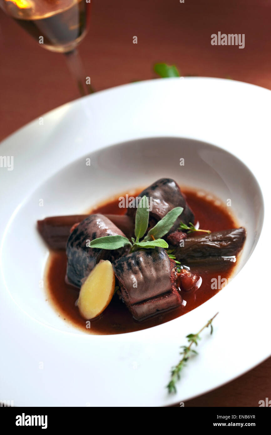Lamprey, leeks and potatoes on a plate Stock Photo