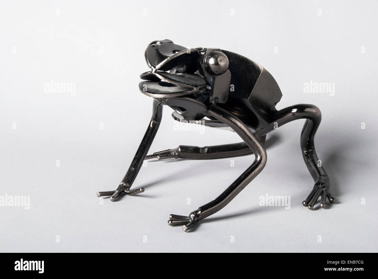 Studio lit, metal frog structure Stock Photo