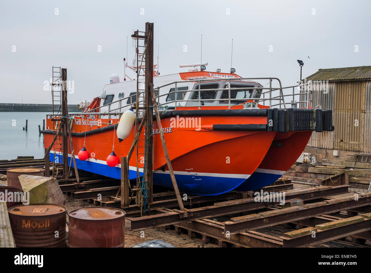 Boat in slips Enterprise North Sea Logistics Ramsgate Harbour Kent Stock Photo