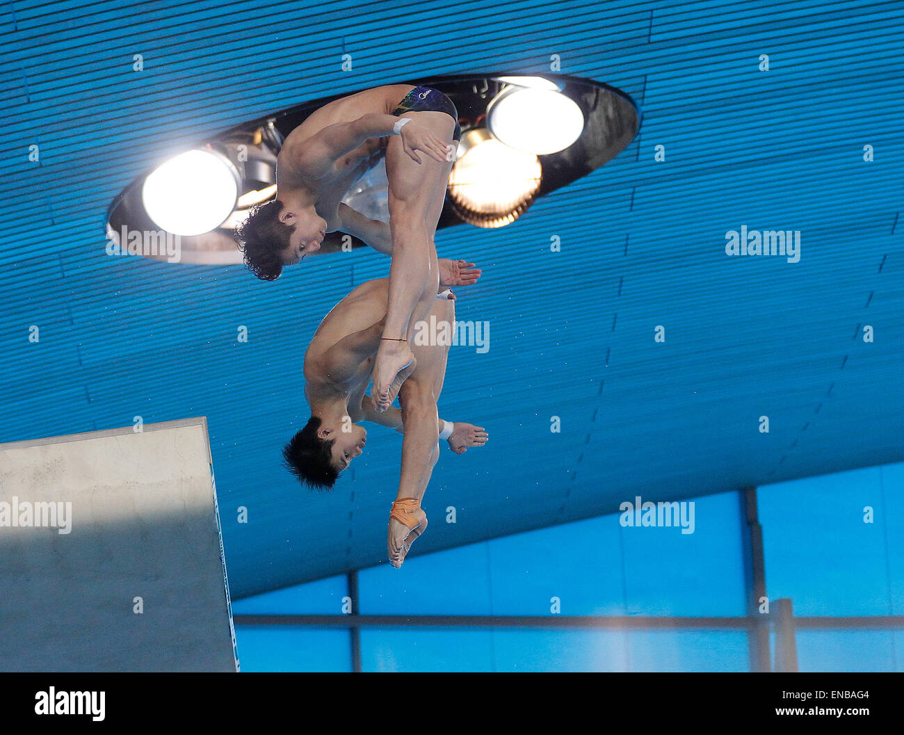 LONDON, UNITED KINGDOM - MAY 01: Yue Lin and Aisen Chen of China compete in the 10m Platform Synchro Men Final during day one of the FINA/NVC Diving World Series 2015 at the London Aquatics Centre on May 01, 2015 in London, Great Britain. (Photo by Mitchell Gunn/ESPA) Stock Photo