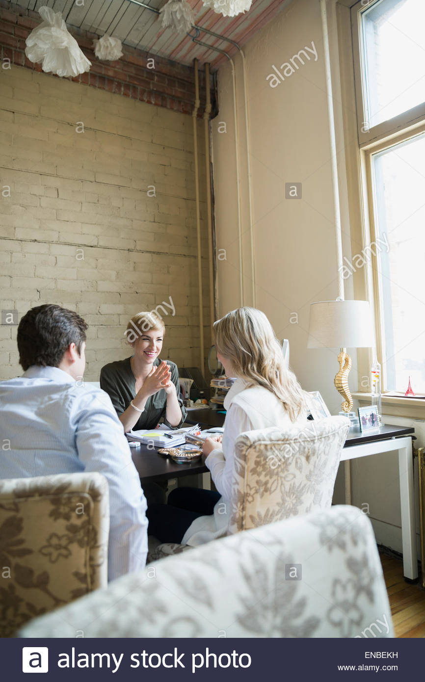 Couple in consultation with interior designer in office Stock Photo