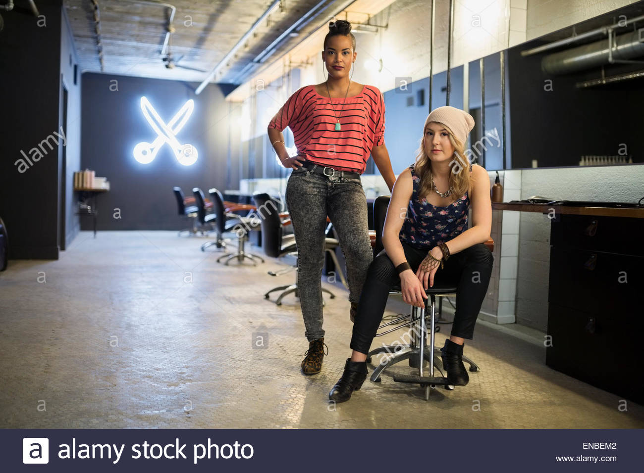 Portrait of young woman sitting at hairdresser salon having hair cut Stock  Photo - Alamy