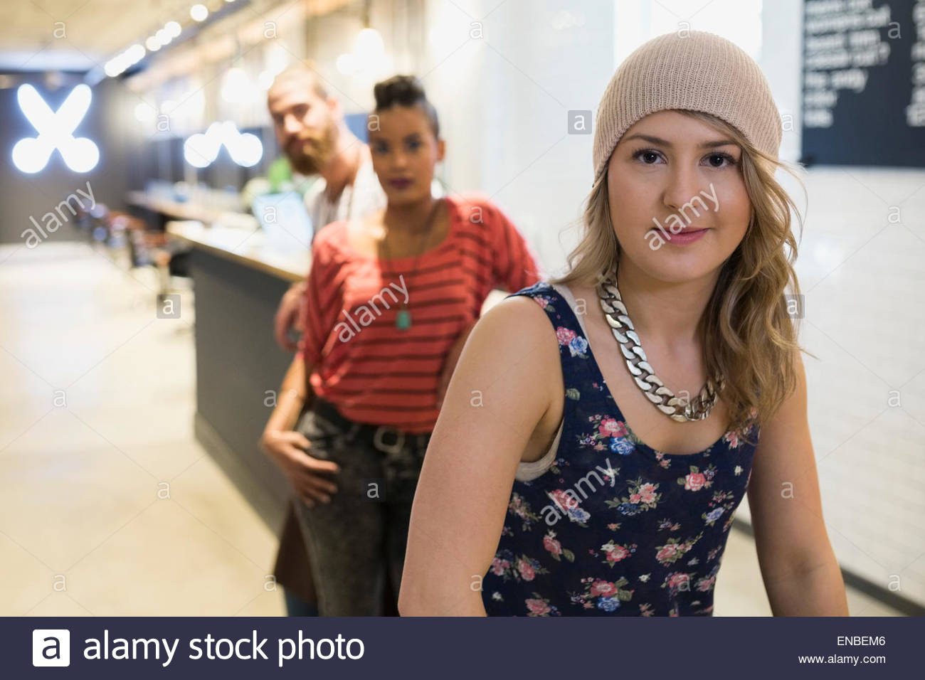 Portrait confident hipster hairstylist partners in hair salon Stock Photo