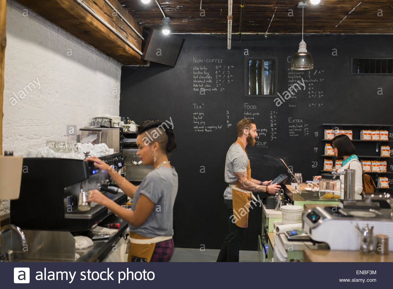 Baristas working at coffee shop Stock Photo Alamy