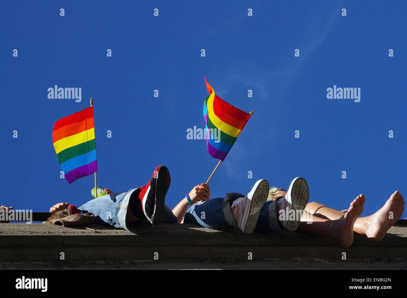 gay pride flags against blue sky in Stockholm Pride Festival Stock Photo