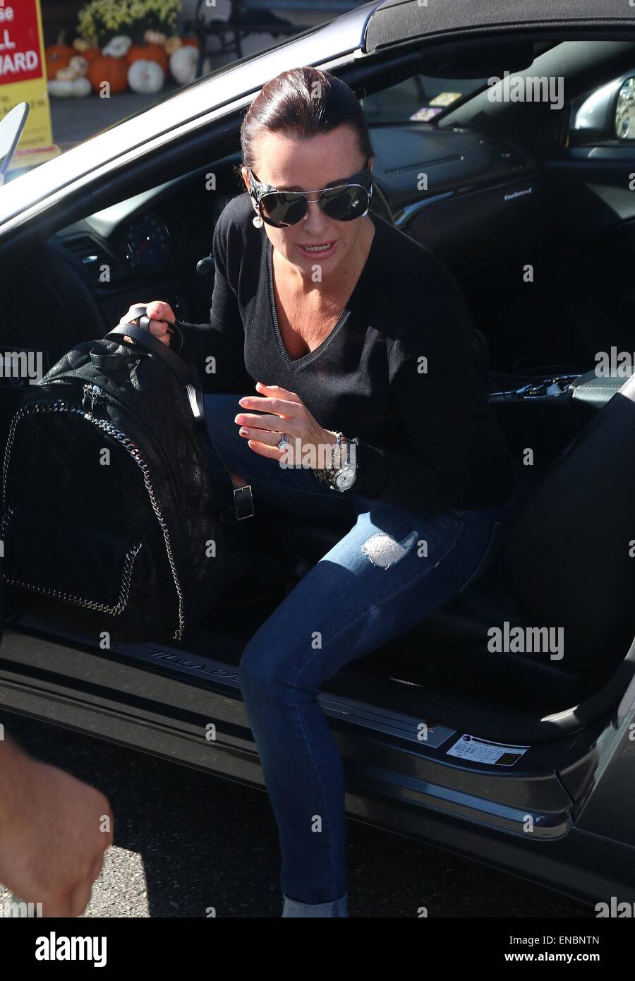 Kyle Richards wearing Chanel lambskin aviator sunglasses and matching