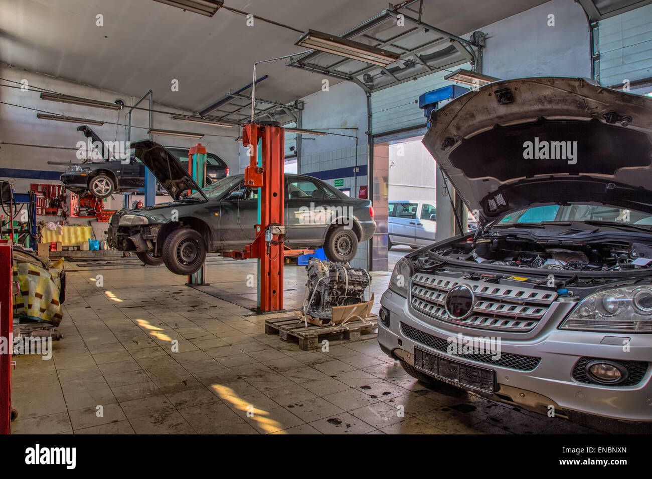 Old style car service with the cars inside Stock Photo Alamy