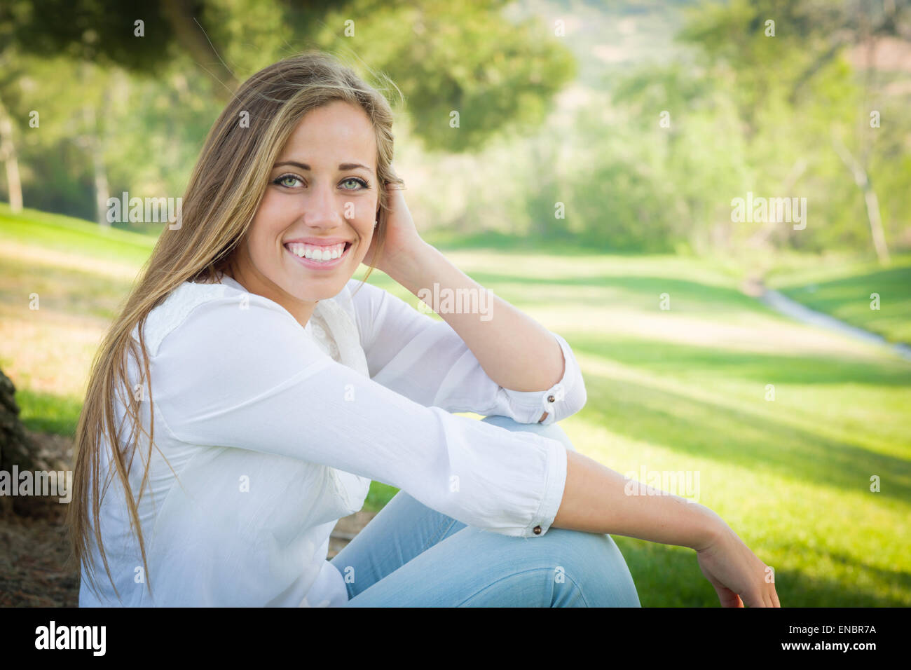 Portrait of a Beautiful Young Woman Outdoors at the Park Stock Photo ...