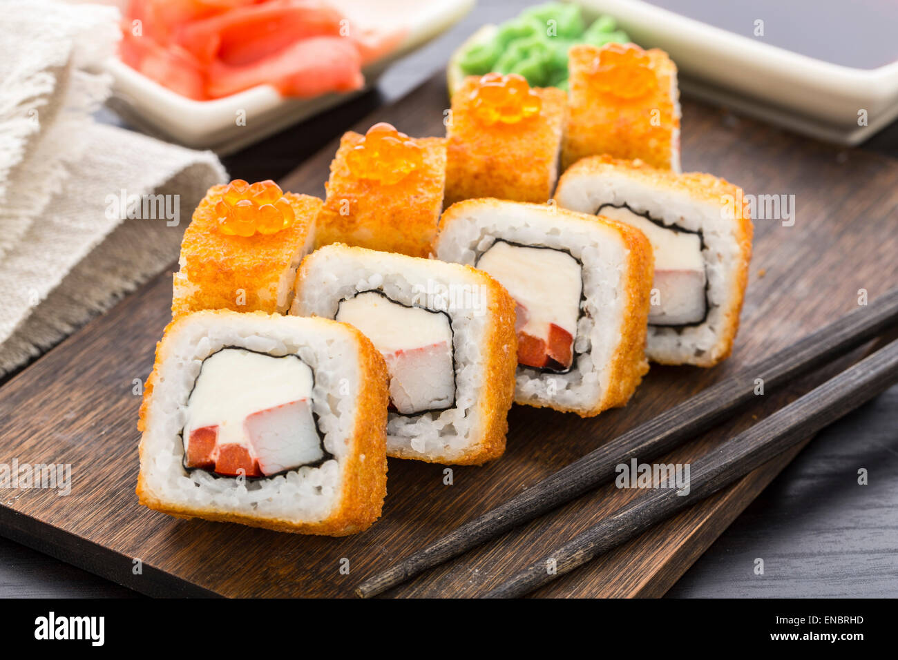Fried sushi roll with shrimp, caviar and cream cheese Stock Photo - Alamy