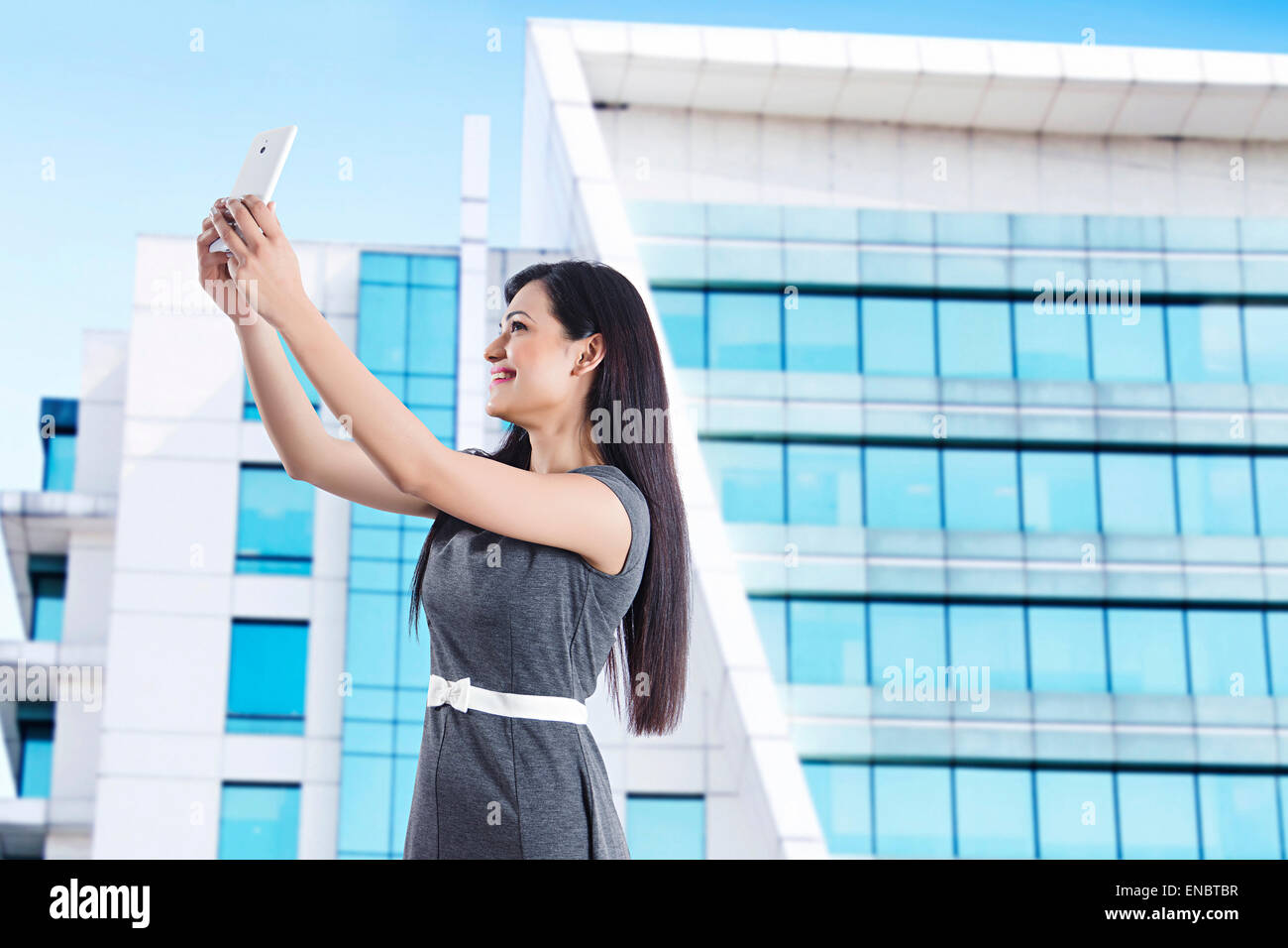 1 indian Business woman phone Clicking Selfie Stock Photo - Alamy