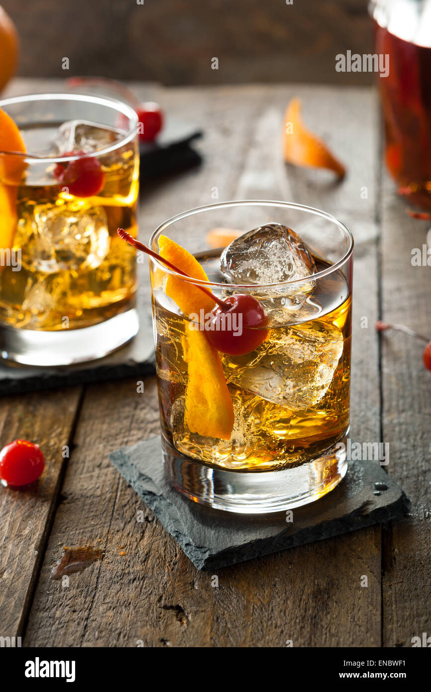 Homemade Old Fashioned Cocktail with Cherries and Orange Peel Stock