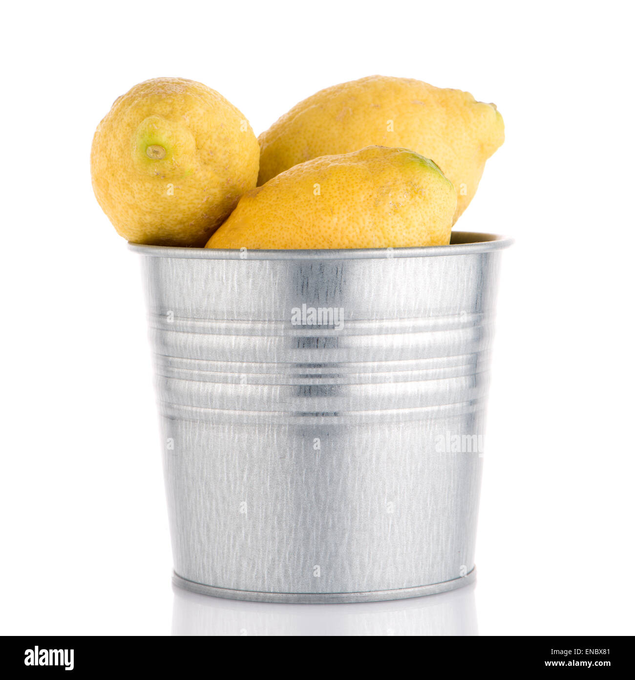 Bucket with lemons on white background Stock Photo Alamy