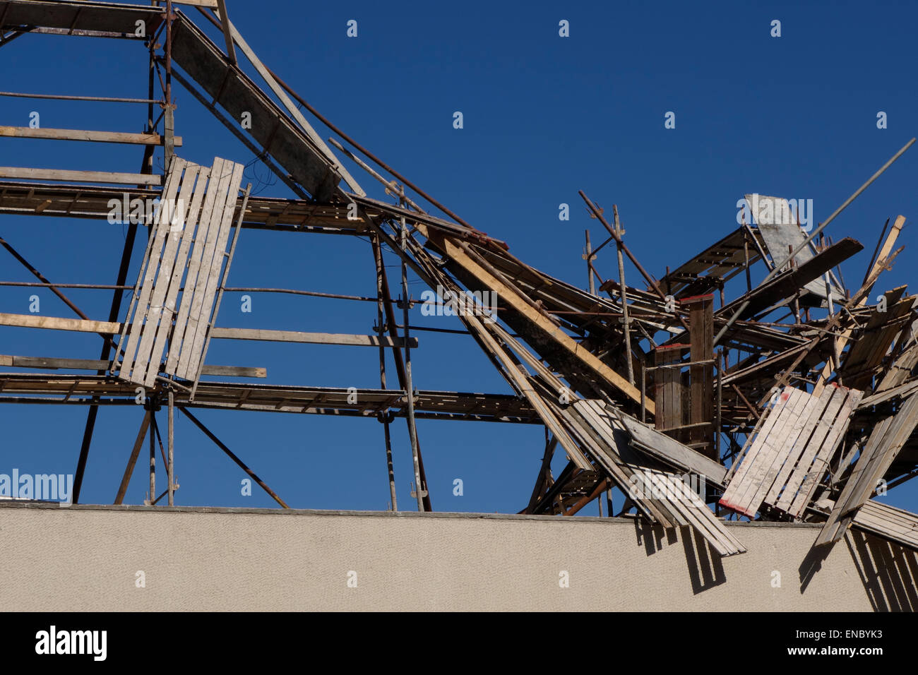 An art installation depicting a collapsed scaffolding entitled “stalagmite” by Israeli artist Shai Ratner placed over Helena Rubinstein Pavilion for Contemporary Art in Tel Aviv Israel Stock Photo