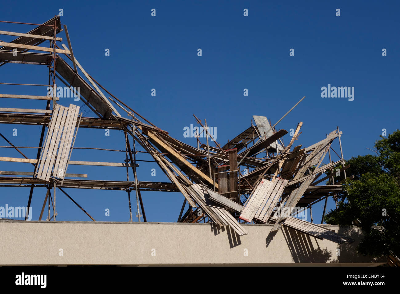 An art installation depicting a collapsed scaffolding entitled “stalagmite” by Israeli artist Shai Ratner placed over Helena Rubinstein Pavilion for Contemporary Art in Tel Aviv Israel Stock Photo