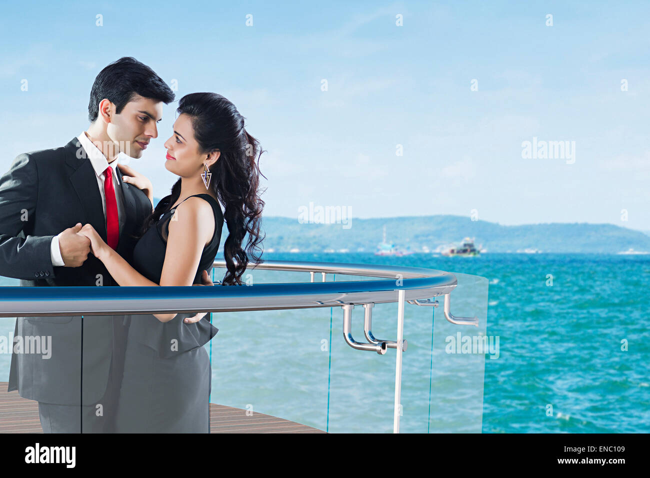 2 indian business Couple beach Resort Balcony romance Stock Photo